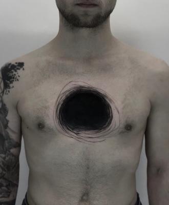 Czarna dziura tatuaż