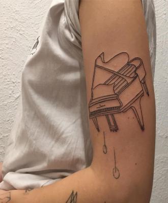Fortepian tatuaż