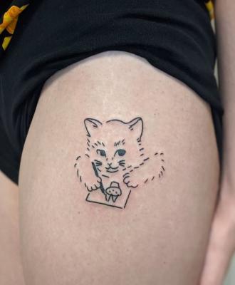 Koteczek tatuaż