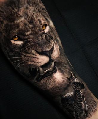 Tatuaż lew i zebra