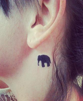 Tatuaże damskie mały słonik
