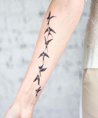 Tatuaże damskie ptaki