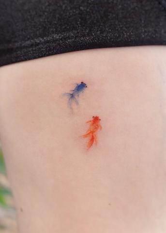 Kolorowe rybki tatuaż