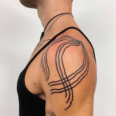 Tatuaże męskie wzory na ramię
